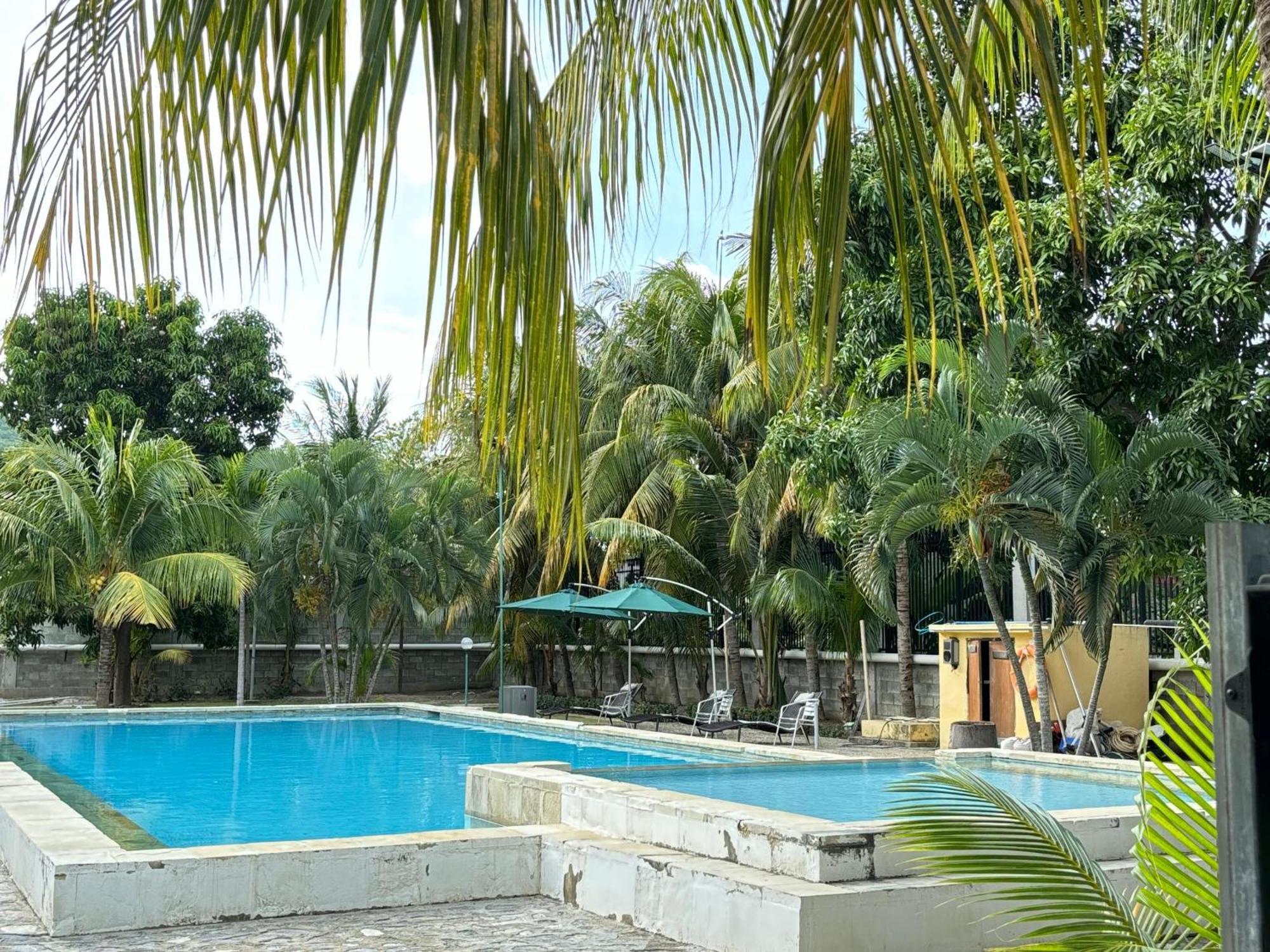 Palm Malinamoc Hotel Dili Buitenkant foto